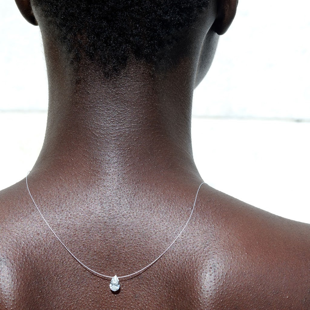 Pear Shaped “Naked” Diamond Pendant