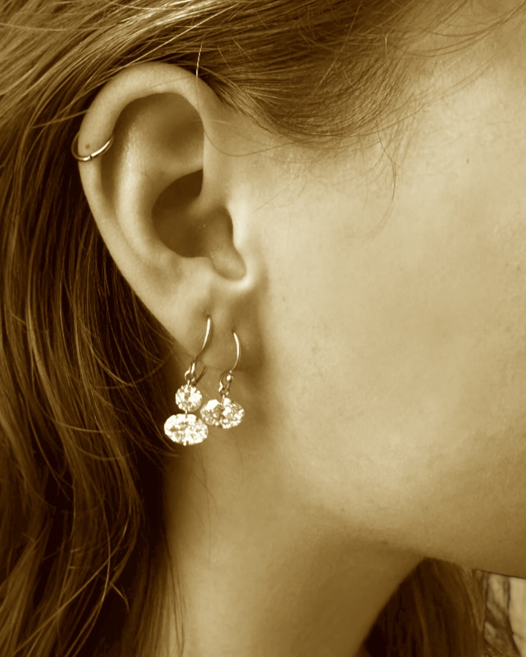 ROUND CUT THREE CARAT FLOATING DIAMOND EARRINGS