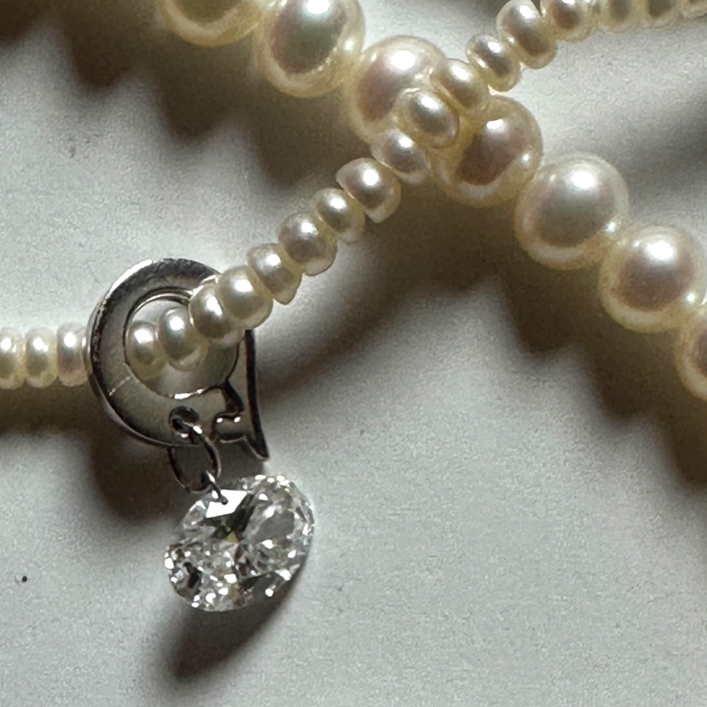 SILVER RHODIUM OVAL DIAMOND CLIP