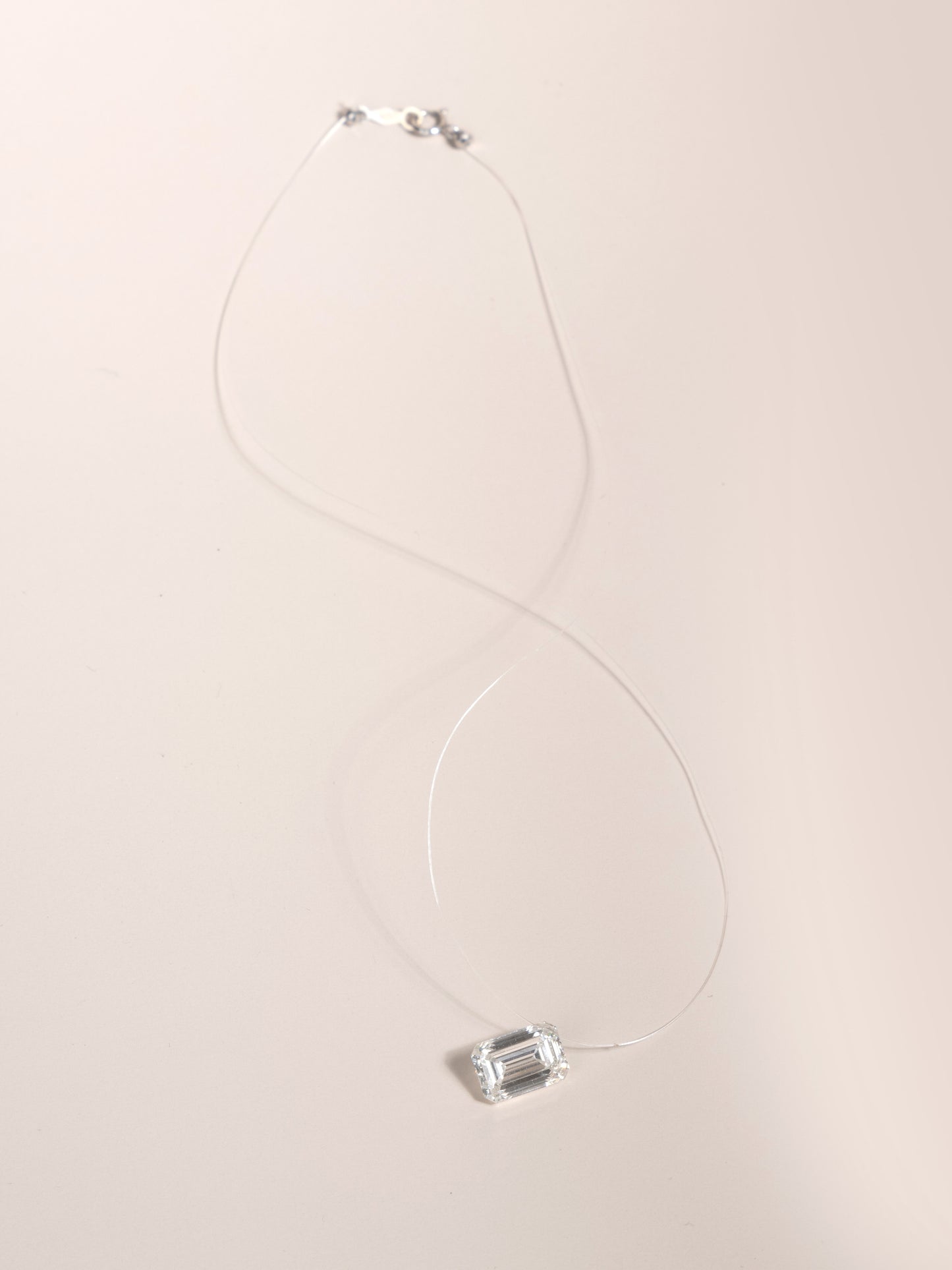 Emerald Cut “Floating” Diamond Pendant